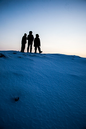 Three Kids on a Snowhill